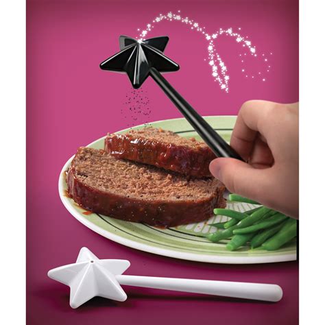 Add a hint of enchantment to your dishes with Fred salt and pepper shakers featuring a whimsical magic wand motif